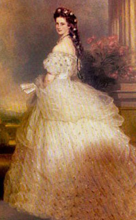 В 70-х годах XIX века появился турнюр – конструкция из ткани, зрительно увеличивающая заднюю часть юбки.